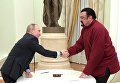 Президент РФ Владимир Путин и американский актер во время встречи в Кремле Президент РФ Владимир Путин и американский актер во время встречи в Кремле