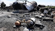 Последствия ракетного удара США по авиабазе Шайрат в Сирии. Архивное фото Последствия ракетного удара США по авиабазе Шайрат в Сирии. Архивное фото