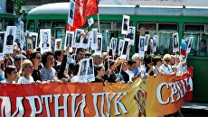 Участники шествия Бессмертный полк в Белграде. Архивное фото Участники шествия Бессмертный полк в Белграде. Архивное фото