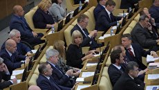 Депутаты на пленарном заседании Государственной Думы. Архивное фото Депутаты на пленарном заседании Государственной Думы. Архивное фото