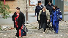 Жильцы дома, частично обрушившегося из-за взрыва газа в Волгограде Жильцы дома, частично обрушившегося из-за взрыва газа в Волгограде