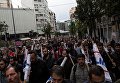 Протестующие во время 24-часовой забастовки в Афинах. 17 мая 2017 Протестующие во время 24-часовой забастовки в Афинах. 17 мая 2017