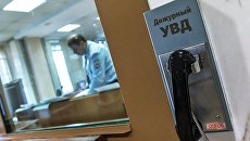 Телефон в дежурной части УВД. Архивное фото Телефон в дежурной части УВД. Архивное фото