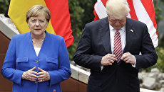 Ангела Меркель и Дональд Трамп. Архивное фото Ангела Меркель и Дональд Трамп. Архивное фото