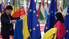Флаги Украины и ЕС на саммите в Брюсселе. 22 июня 2017 Флаги Украины и ЕС на саммите в Брюсселе. 22 июня 2017