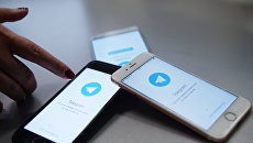 Мессенджер Telegram на экране телефона. Архивное фото Мессенджер Telegram на экране телефона. Архивное фото