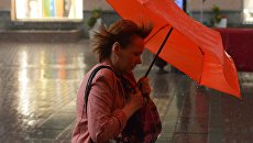 Дождь в Москве. Архивное фото Дождь в Москве. Архивное фото