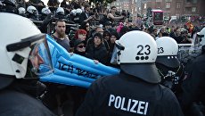 Во время акции протеста в преддверии саммита G20 в Гамбурге. 7 июля 2017 год. Архивное фото Во время акции протеста в преддверии саммита G20 в Гамбурге. 7 июля 2017 год. Архивное фото