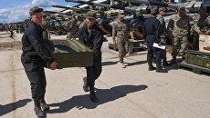 Участники перед началом репетиции международного этапа конкурса Танковый биатлон Армейских международных игр-2017 в Алабино Участники перед началом репетиции международного этапа конкурса Танковый биатлон Армейских международных игр-2017 в Алабино