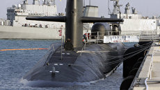 Подводная лодка ВМФ США класса Ohio на военно-морской базе в Пусане, Южная Корея Подводная лодка ВМФ США класса Ohio на военно-морской базе в Пусане, Южная Корея