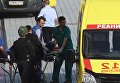 Транспортировка раненого к автомобилю скорой медицинской помощи у здания Московского областного суда, в котром произошла перестрелка. 1 августа 2017 Транспортировка раненого к автомобилю скорой медицинской помощи у здания Московского областного суда, в котром произошла перестрелка. 1 августа 2017