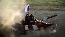 Танк команды армии России в финальной эстафете на соревнованиях по танковому биатлону. 12 августа 2017 Танк команды армии России в финальной эстафете на соревнованиях по танковому биатлону. 12 августа 2017