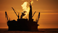 Добыча нефти. Архивное фото Добыча нефти. Архивное фото