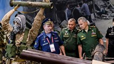 Министр обороны России Сергей Шойгу на экспозиции МВТФ Армия-2017, посвященной деятельности российской группировки войск в Сирии. 23 августа 2017 Министр обороны России Сергей Шойгу на экспозиции МВТФ Армия-2017, посвященной деятельности российской группировки войск в Сирии. 23 августа 2017