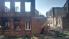 Дома на Театральном спуске в Ростове-на-Дону после крупного пожара. Архивное фото Дома на Театральном спуске в Ростове-на-Дону после крупного пожара. Архивное фото
