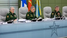 Первый заместитель министра обороны РФ Руслан Цаликов, Сергей Шойгу и начальник Генерального штаба ВС РФ Валерий Герасимов во время селекторного совещания министра обороны с руководящим составом Вооруженных Сил. 6 октября 2017 Первый заместитель министра обороны РФ Руслан Цаликов, Сергей Шойгу и начальник Генерального штаба ВС РФ Валерий Герасимов во время селекторного совещания министра обороны с руководящим составом Вооруженных Сил. 6 октября 2017