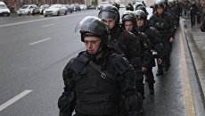 Сотрудники правоохранительных органов во время несанкционированной акции на Пушкинской площади в Москве. 7 октября 2017 Сотрудники правоохранительных органов во время несанкционированной акции на Пушкинской площади в Москве. 7 октября 2017