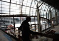 Рабочий на территории строительства нового терминала аэропорта Домодедово Рабочий на территории строительства нового терминала аэропорта Домодедово
