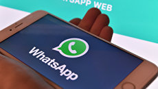 Логотип мессенджера WhatsApp. Архивное фото Логотип мессенджера WhatsApp. Архивное фото