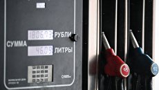 Колонка на автозаправочной станции. Архивное фото Колонка на автозаправочной станции. Архивное фото