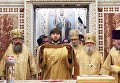 Священнослужители во время литургии в храме Христа Спасителя Священнослужители во время литургии в храме Христа Спасителя