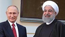 Президент РФ Владимир Путин и президент Ирана Хасан Рухани. Архивное фото Президент РФ Владимир Путин и президент Ирана Хасан Рухани. Архивное фото