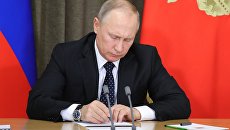 Президент РФ Владимир Путин. Архивное фото Президент РФ Владимир Путин. Архивное фото
