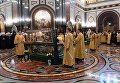 Патриарх Московский и всея Руси Кирилл во время торжественного молебна перед ракой с мощами святителя Московского Тихона по случаю начала Архиерейского собора Русской православной церкви в храме Христа Спасителя Патриарх Московский и всея Руси Кирилл во время торжественного молебна перед ракой с мощами святителя Московского Тихона по случаю начала Архиерейского собора Русской православной церкви в храме Христа Спасителя