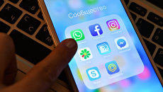 Иконки мессенджеров и приложений социальных соцетей на экране смартфона. Архивное фото Иконки мессенджеров и приложений социальных соцетей на экране смартфона. Архивное фото