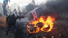 Участники акции протеста в Палестине против решения о признании Иерусалима столицей Израиля. 7 декабря 2017 Участники акции протеста в Палестине против решения о признании Иерусалима столицей Израиля. 7 декабря 2017