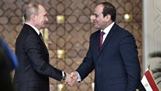 Владимир Путин и Абдельфаттах Сиси. Архивное фото Владимир Путин и Абдельфаттах Сиси. Архивное фото