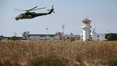 Российский вертолет Ми-24 во время облета авиабазы Хмеймим в Сирии. Архивное фото Российский вертолет Ми-24 во время облета авиабазы Хмеймим в Сирии. Архивное фото