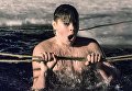 Верующий во время традиционного праздничного купания в Крещенский сочельник на территории Валдайского Иверского Святоозерского Богородицкого мужского монастыря в Новгородской области Верующий во время традиционного праздничного купания в Крещенский сочельник на территории Валдайского Иверского Святоозерского Богородицкого мужского монастыря в Новгородской области