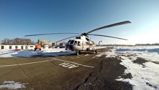 Вертолет МИ-8 Хабаровского авиационно-спасательного центра МЧС России, принимающий участие в поисках судна Восток. Архивное фото Вертолет МИ-8 Хабаровского авиационно-спасательного центра МЧС России, принимающий участие в поисках судна Восток. Архивное фото
