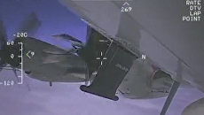 Опубликованные ВМС США кадры перехвата разведчика EP-3 российским Су-27 Опубликованные ВМС США кадры перехвата разведчика EP-3 российским Су-27