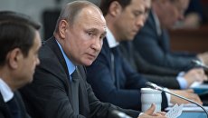 Владимир Путин во время заседания президиума Государственного совета РФ. 1 февраля 2018 Владимир Путин во время заседания президиума Государственного совета РФ. 1 февраля 2018