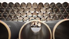 Трубы для газопровода Северный поток ‑ 2 на заводе по обетонированию в Котке, Финляндия. Архивное фото Трубы для газопровода Северный поток ‑ 2 на заводе по обетонированию в Котке, Финляндия. Архивное фото
