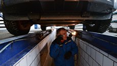 Технический осмотр автомобилей. Архивное фото Технический осмотр автомобилей. Архивное фото