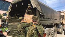 Российские военные доставили гуманитарную помощь в Сирию. Архивное фото Российские военные доставили гуманитарную помощь в Сирию. Архивное фото