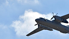 Военно-транспортный самолет Ан-26. Архивное фото Военно-транспортный самолет Ан-26. Архивное фото