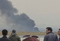 Столб дыма на месте крушения пассажирского лайнера в Непале Столб дыма на месте крушения пассажирского лайнера в Непале