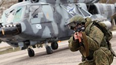 Военнослужащий во время тактико-специальных учений. Архивное фото Военнослужащий во время тактико-специальных учений. Архивное фото