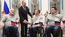 Президент РФ Владимир Путин во время встречи с российскими спортсменами – победителями и призёрами XII Паралимпийских зимних игр в Пхёнчхане. 20 марта 2018 Президент РФ Владимир Путин во время встречи с российскими спортсменами – победителями и призёрами XII Паралимпийских зимних игр в Пхёнчхане. 20 марта 2018