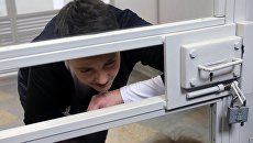 Депутат Верховной рады Украины Надежда Савченко во время заседания суда. Архивное фото Депутат Верховной рады Украины Надежда Савченко во время заседания суда. Архивное фото