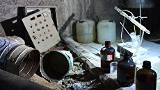 Химическая лаборатория боевиков по изготовлению отравляющих веществ и взрывчатки в подвале одного из домов в освобожденом пригороде Дамаска Думе. 18 апреля 2018 Химическая лаборатория боевиков по изготовлению отравляющих веществ и взрывчатки в подвале одного из домов в освобожденом пригороде Дамаска Думе. 18 апреля 2018