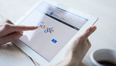 Google на ipad. Архивное фото Google на ipad. Архивное фото