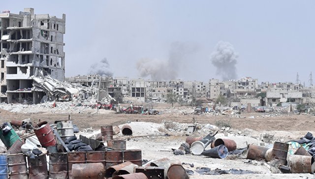 Одна из улиц в районе бывшего лагеря палестинских беженцев Ярмук в южном пригороде Дамаска. Архивное фото Одна из улиц в районе бывшего лагеря палестинских беженцев Ярмук в южном пригороде Дамаска. Архивное фото