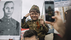 Участники акции Бессмертный полк Участники акции Бессмертный полк