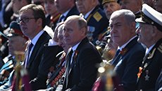 Президент России Владимир Путин во время военного парада в ознаменование 73-й годовщины Победы в Великой Отечественной войне 1941–1945 годов на Красной площади в Москве. 9 мая 2018 Президент России Владимир Путин во время военного парада в ознаменование 73-й годовщины Победы в Великой Отечественной войне 1941–1945 годов на Красной площади в Москве. 9 мая 2018