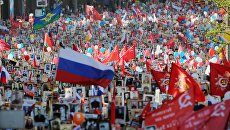 Участники акции Бессмертный полк в Москве. 9 мая 2018 Участники акции Бессмертный полк в Москве. 9 мая 2018